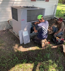 Workers working on unit