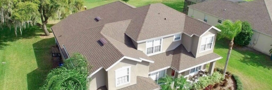 Photo of a large asphalt roof house
