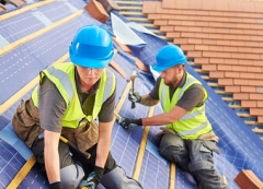 Photo of roofers working on an installation