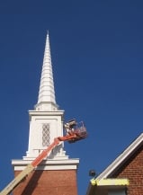 Professional painter on a lift