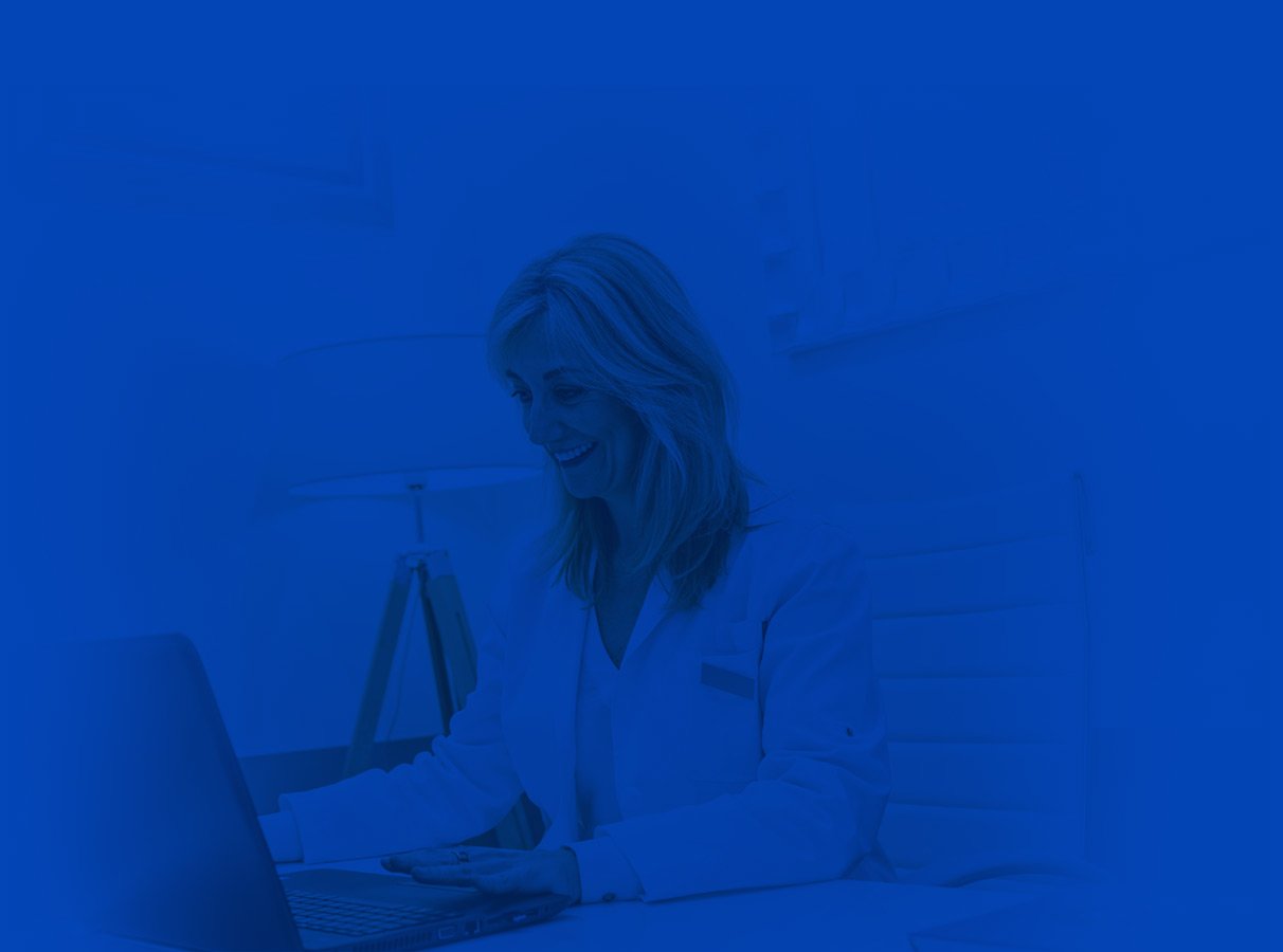 Confident office manager/dentist reviewing claims