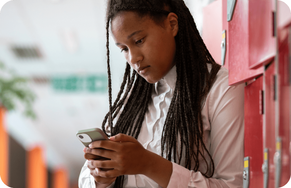 Girl looking down at phone