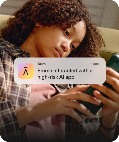 Kid using phone. Aura notification says Emma interacted with a high-risk AI app.