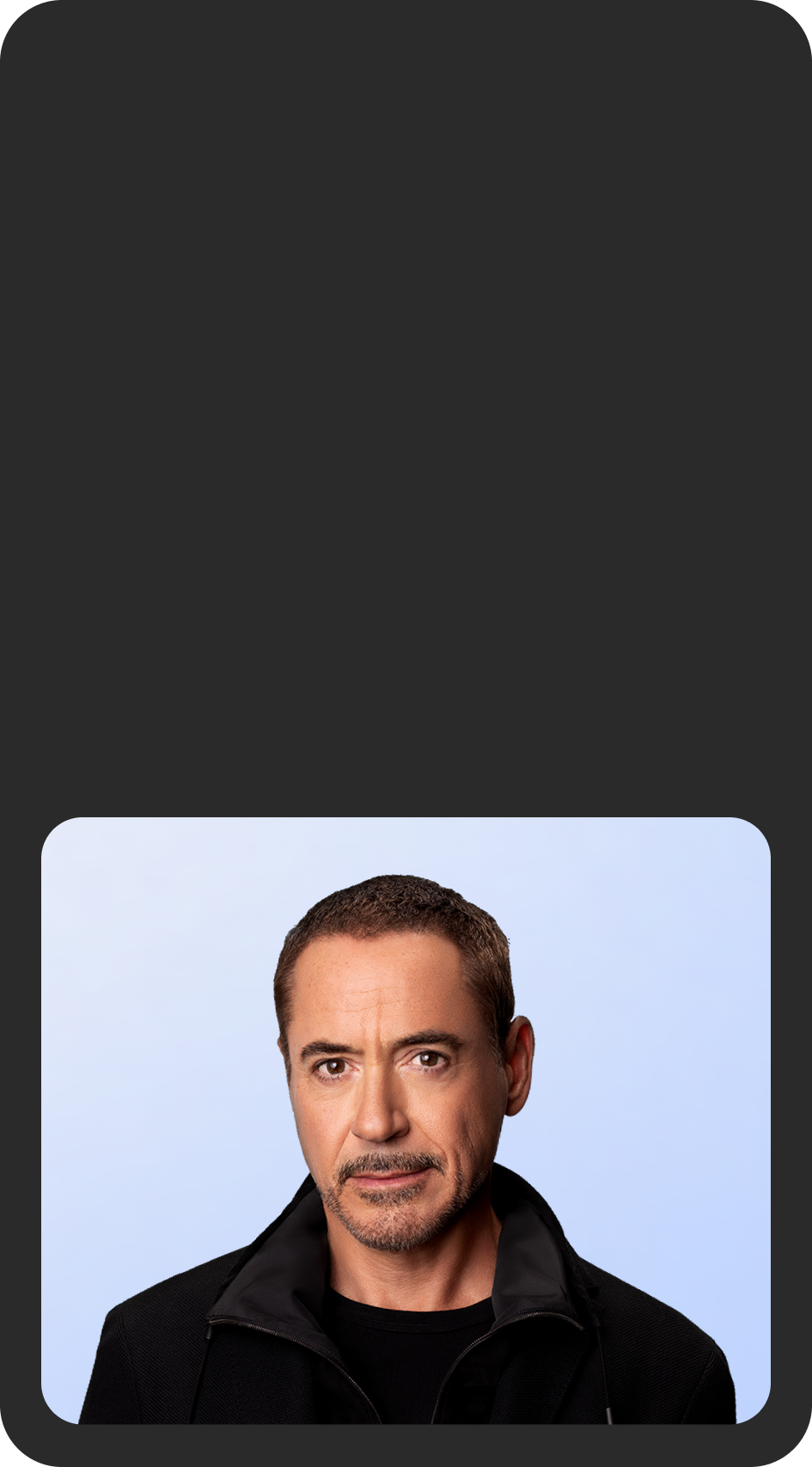 Background image with a photo of Robert Downey Jr.