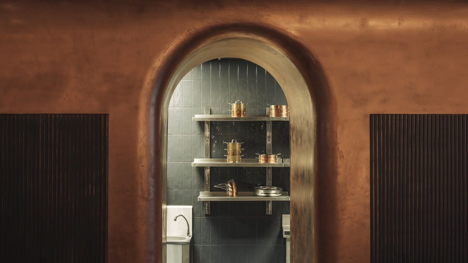 Le Petit Bon Bon — copper-clad kitchen enclosures at Corinthia Brussels