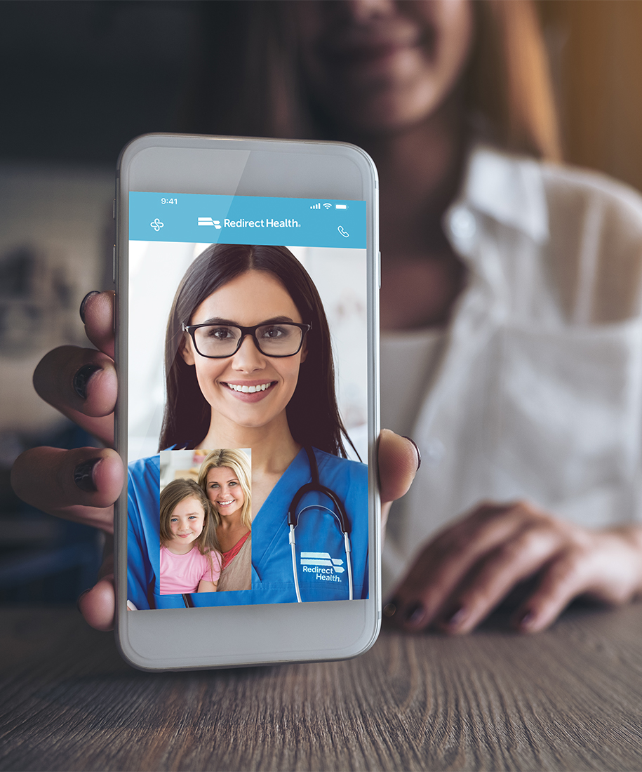Virtual Primary Care Woman Holding Phone